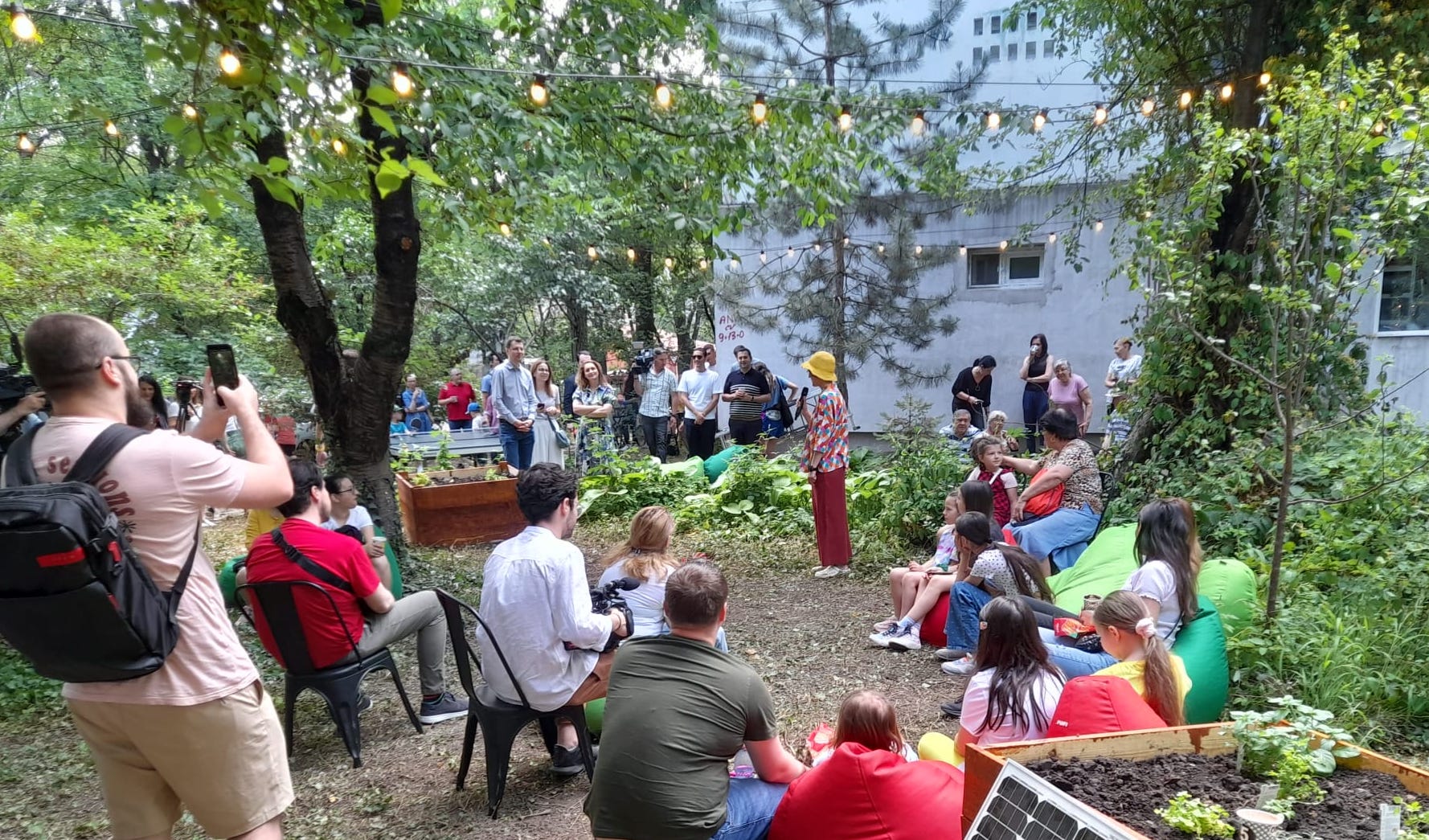 Community gathering in a green neighborhood courtyard